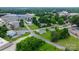 Aerial view of a residential property in a neighborhood with nearby commercial areas at 1266 18Th Ne St, Hickory, NC 28601