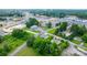 Overhead view of a home surrounded by mature trees near a commercial district at 1266 18Th Ne St, Hickory, NC 28601