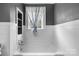 Bright bathroom with classic tub and stylish wall details at 1266 18Th Ne St, Hickory, NC 28601