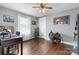 Bedroom with hardwood floors, fan, and natural light at 1266 18Th Ne St, Hickory, NC 28601