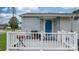 Inviting front porch with white railing and blue front door at 1266 18Th Ne St, Hickory, NC 28601