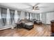 Inviting living room with neutral tones, ceiling fan, and ample natural light at 1266 18Th Ne St, Hickory, NC 28601