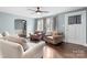 Comfortable living room boasts hardwood floors, neutral walls, and natural light at 1266 18Th Ne St, Hickory, NC 28601