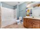 Hall bath featuring a tub and shower combination with stylish accent walls at 13305 Mallard Landing Rd, Charlotte, NC 28278