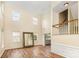 Spacious living room with high ceilings, large windows, and hardwood floors at 13305 Mallard Landing Rd, Charlotte, NC 28278