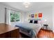 Bright bedroom with a cozy bed, natural light from the window, and stylish decor at 1344 Shannonhouse Dr, Charlotte, NC 28215