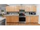 Well-equipped kitchen with stainless steel appliances and ample counter space at 1344 Shannonhouse Dr, Charlotte, NC 28215