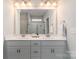 Elegant bathroom featuring double vanity, modern fixtures, and a glass-enclosed shower at 148 Kerri Dawn Ln, Locust, NC 28097