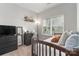 Cozy bedroom with ample natural light, comfortable furniture, and serene decor at 148 Kerri Dawn Ln, Locust, NC 28097