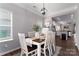 Inviting dining space with modern table setting and bright, airy atmosphere at 148 Kerri Dawn Ln, Locust, NC 28097