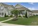 Well-maintained home with a landscaped lawn and inviting curb appeal at 148 Kerri Dawn Ln, Locust, NC 28097