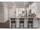 Bright kitchen features granite countertops, stainless appliances, and modern finishes at 148 Kerri Dawn Ln, Locust, NC 28097