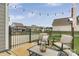 Cozy patio seating area with stylish outdoor furniture and string lights at 148 Kerri Dawn Ln, Locust, NC 28097