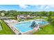 Large community pool with a slide and clubhouse providing a relaxing and recreational space at 1522 Napa Nw St, Concord, NC 28027