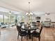 Open floor plan showcasing the dining room, living room, and access to the outdoors at 200 Sweet Briar Dr, Fort Mill, SC 29707