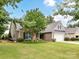 Charming home with a well-manicured lawn, mature trees, and inviting curb appeal at 200 Sweet Briar Dr, Fort Mill, SC 29707