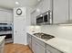 Modern kitchen featuring stainless steel appliances, white backsplash, and plenty of cabinet space at 200 Sweet Briar Dr, Fort Mill, SC 29707