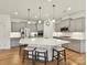 Spacious kitchen with a large island, stainless steel appliances, pendant lighting, and ample cabinet space at 200 Sweet Briar Dr, Fort Mill, SC 29707
