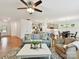 Open-concept living room and kitchen, perfect for entertaining, with hardwood floors and ample seating at 200 Sweet Briar Dr, Fort Mill, SC 29707