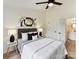 Bedroom featuring a modern design, a queen bed, and an ensuite bathroom at 2017 Brewton Dr, Charlotte, NC 28206