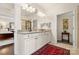 Bathroom featuring double vanity with granite counters, access to bedroom and walk-in shower at 2066 Vermount Way, Indian Land, SC 29707