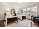 Cozy bedroom featuring two beds, soft natural light, and neutral decor at 2066 Vermount Way, Indian Land, SC 29707