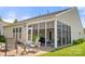 Enclosed sunroom with outdoor seating just off of the main house with lots of natural light at 2066 Vermount Way, Indian Land, SC 29707