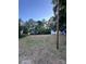 Sloping yard with a view of a small home in the background at 2096 S Point Rd, Belmont, NC 28012