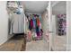 Well-organized closet with ample storage, featuring clothes racks, shelves, and storage bins for efficient organization at 2146 Marwood Ln, Albemarle, NC 28001
