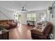 Open living room featuring wood floors and natural light at 2146 Marwood Ln, Albemarle, NC 28001