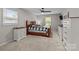 Comfortable main bedroom with a ceiling fan and two dressers at 2146 Marwood Ln, Albemarle, NC 28001