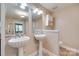 Bathroom with double vessel sinks on pedestals with tiled floors at 257 Amity Dr, York, SC 29745
