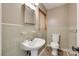 Basic bathroom with neutral tile, a pedestal sink, and standard fixtures for a functional space at 257 Amity Dr, York, SC 29745