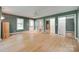 Spacious bedroom with hardwood floors, offering excellent closet space and natural light from multiple windows at 257 Amity Dr, York, SC 29745