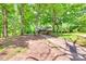 Charming single-story home with a long driveway surrounded by lush greenery and mature trees at 257 Amity Dr, York, SC 29745