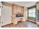 Kitchen nook with wooden cabinets and countertops, complemented by wood-look floors at 257 Amity Dr, York, SC 29745