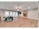 Bright living area features a fireplace, hardwood floors, and French doors at 257 Amity Dr, York, SC 29745
