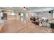 Spacious open living area flows into a modern kitchen with hardwood flooring at 257 Amity Dr, York, SC 29745