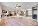 Large open floor plan with wood floors, fireplace, and seamless kitchen access at 257 Amity Dr, York, SC 29745