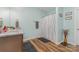 Neutral bathroom featuring a granite vanity, shower, and decorative accents at 2705 Enon Church Rd, Salisbury, NC 28147