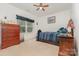 Comfortable bedroom with a cozy bed, dresser, and bright window at 2705 Enon Church Rd, Salisbury, NC 28147