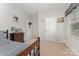 Comfortable bedroom with wood furnishings, neutral carpet, and a sunny window for natural light at 2705 Enon Church Rd, Salisbury, NC 28147