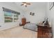 Cozy bedroom featuring a twin-sized bed, neutral decor, and a window view at 2705 Enon Church Rd, Salisbury, NC 28147