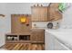 Convenient mud room area with built-in storage, coat hooks, and adjacent laundry space at 2705 Enon Church Rd, Salisbury, NC 28147