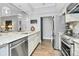 Modern kitchen featuring stainless steel appliances and a stylish backsplash at 300 W 5Th St # 003, Charlotte, NC 28202