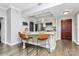 Updated kitchen boasts bar seating, granite countertops, and stainless steel appliances at 300 W 5Th St # 003, Charlotte, NC 28202