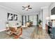 Inviting living room with dining area, modern decor, and ample natural light at 300 W 5Th St # 003, Charlotte, NC 28202