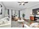 Inviting living room with dining area, modern decor, and ample natural light at 300 W 5Th St # 003, Charlotte, NC 28202