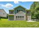 Two-story house featuring a well-maintained grassy backyard and neutral siding at 3106 Crosswind Dr, Fort Mill, SC 29707