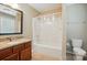 Full bathroom with granite vanity top and shower-tub combination at 3106 Crosswind Dr, Fort Mill, SC 29707
